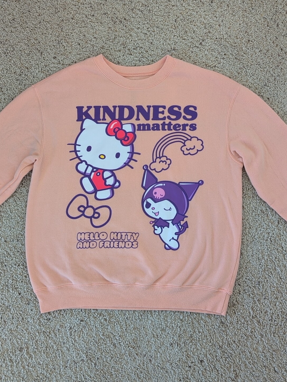 Hello Kitty Peach Crewneck with Colorful Graphics
